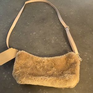 Brand new faux fur tan crossbody purse.